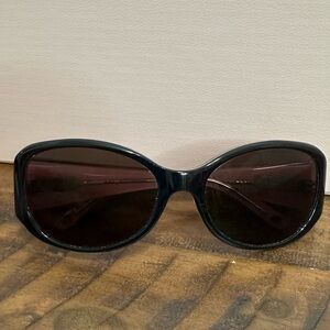Bebe Prescription Black/Pink Oval Sunglasses with Glossy Finish